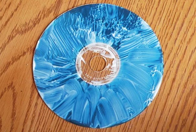 CD rayado cubierto pulido